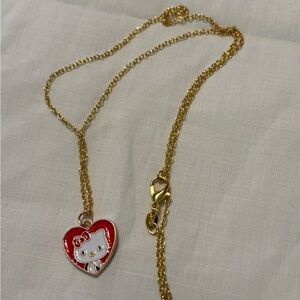 Gold tone Hello Kitty enamel pendant necklace